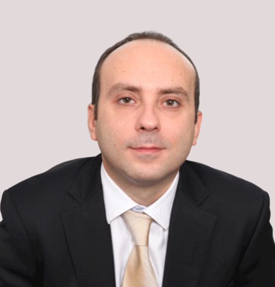 Associate Professor with Tenure Ozgur Evren